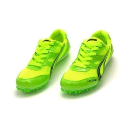 Zielone buty lekkoatletyczne z kolcami do biegów i skoków na bieżni Legend 44